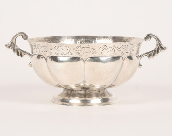 Appraisal: Sterling silver double handled and footed repousse bowl with various