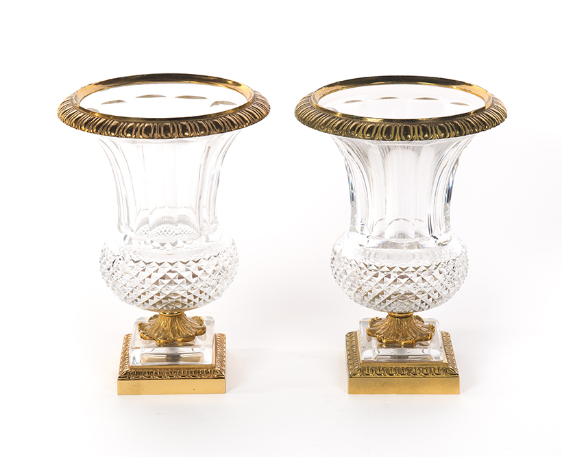 Appraisal: PAIR OF CUT CRYSTAL URNS WITH BRONZE MOUNTS France nd