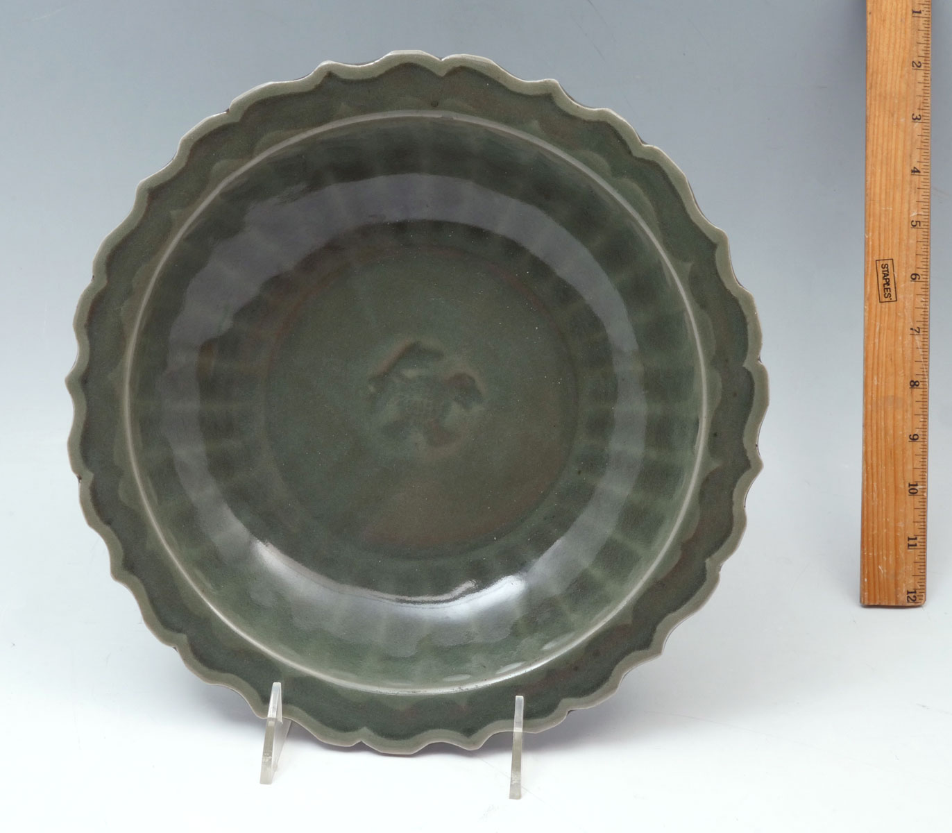 Appraisal: CHINESE CELADON CENTER MING DYNASTY BOWL Chinese green celadon glazed