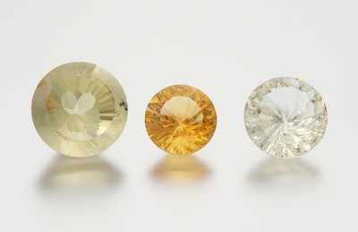 Appraisal: A Group of Three Unmounted Designer Cut Color Quartz Gems