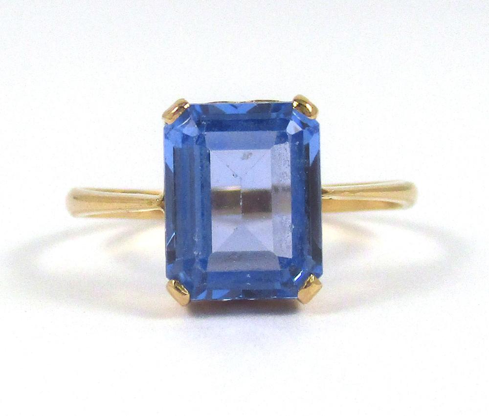 Appraisal: BLUE SPINEL AND FOURTEEN KARAT ROSE GOLD RING The solitaire