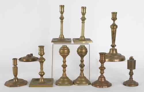 Appraisal: Group of miscellaneous brass candlesticks and oil lamps th c