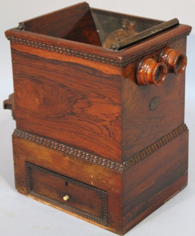 Appraisal: A thC rosewood cased Sealey Lee tabletop stereoscope with two