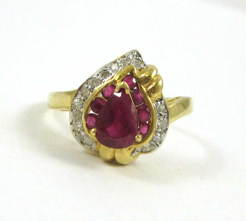 Appraisal: RUBY DIAMOND AND FOURTEEN KARAT GOLD RING with round single-cut