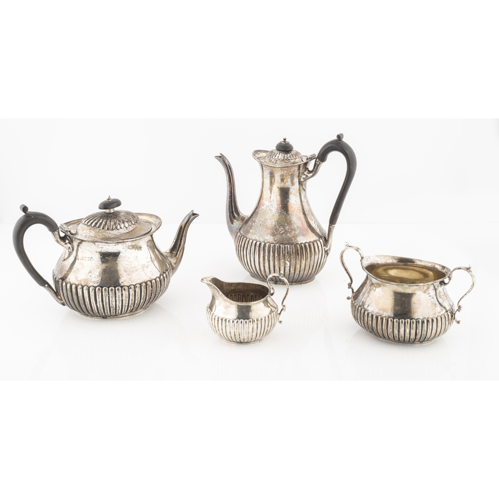 Appraisal: A late Victorian four piece tea and coffee service Martin