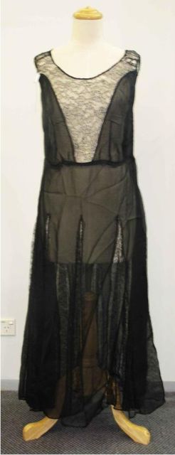 Appraisal: s evening dress in black silk with chantilly lace panels