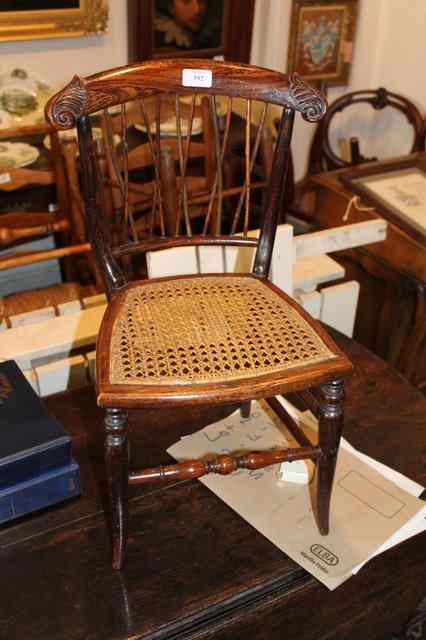 Appraisal: A TH CENTURY SIMULATED ROSEWOOD CHILD'S CHAIR with cane seat