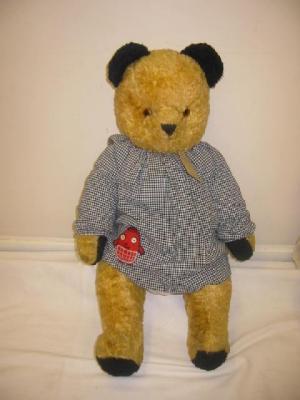 Appraisal: An English teddy bear with black ears and pads and