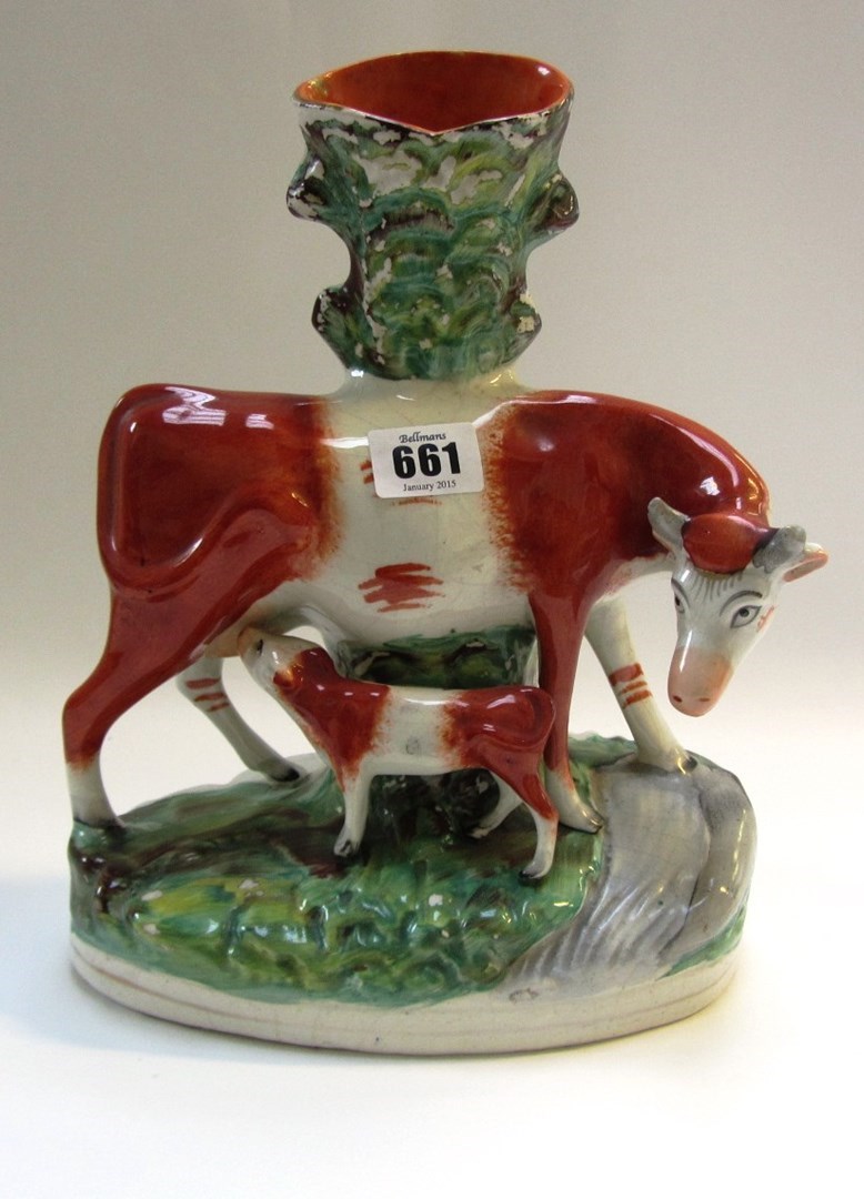 Appraisal: A group of Staffordshire animals th century comprising a pair