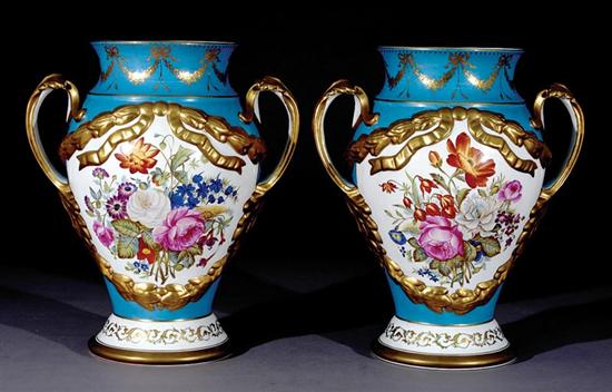 Appraisal: Impressive pair Sevres style urns celestial blue ground with gilt