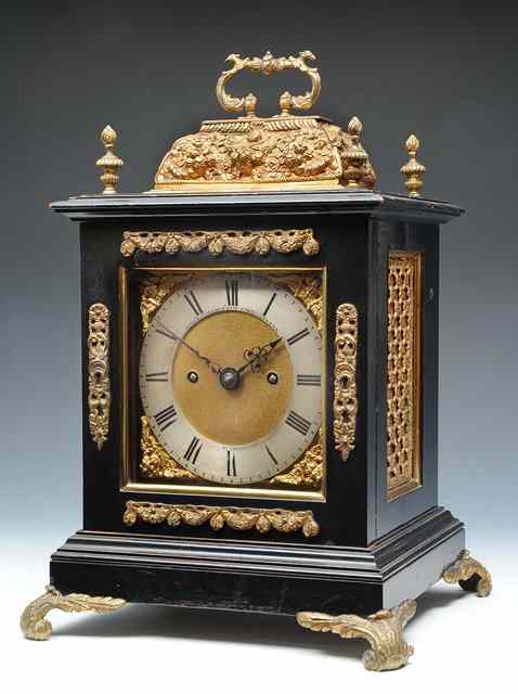 Appraisal: A LATE TH CENTURY STYLE TABLE CLOCK the square brass