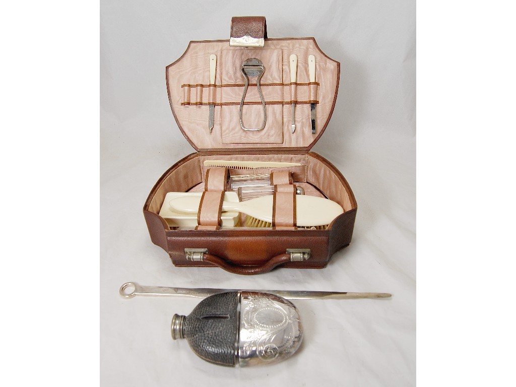 Appraisal: Gent's travelling toilette set with silver plated mounts to w