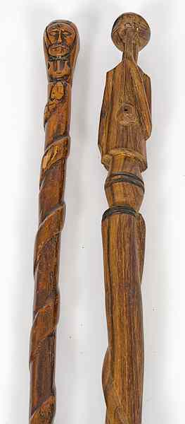 Appraisal: Folk Art Carved Figural Canes American early th century Two