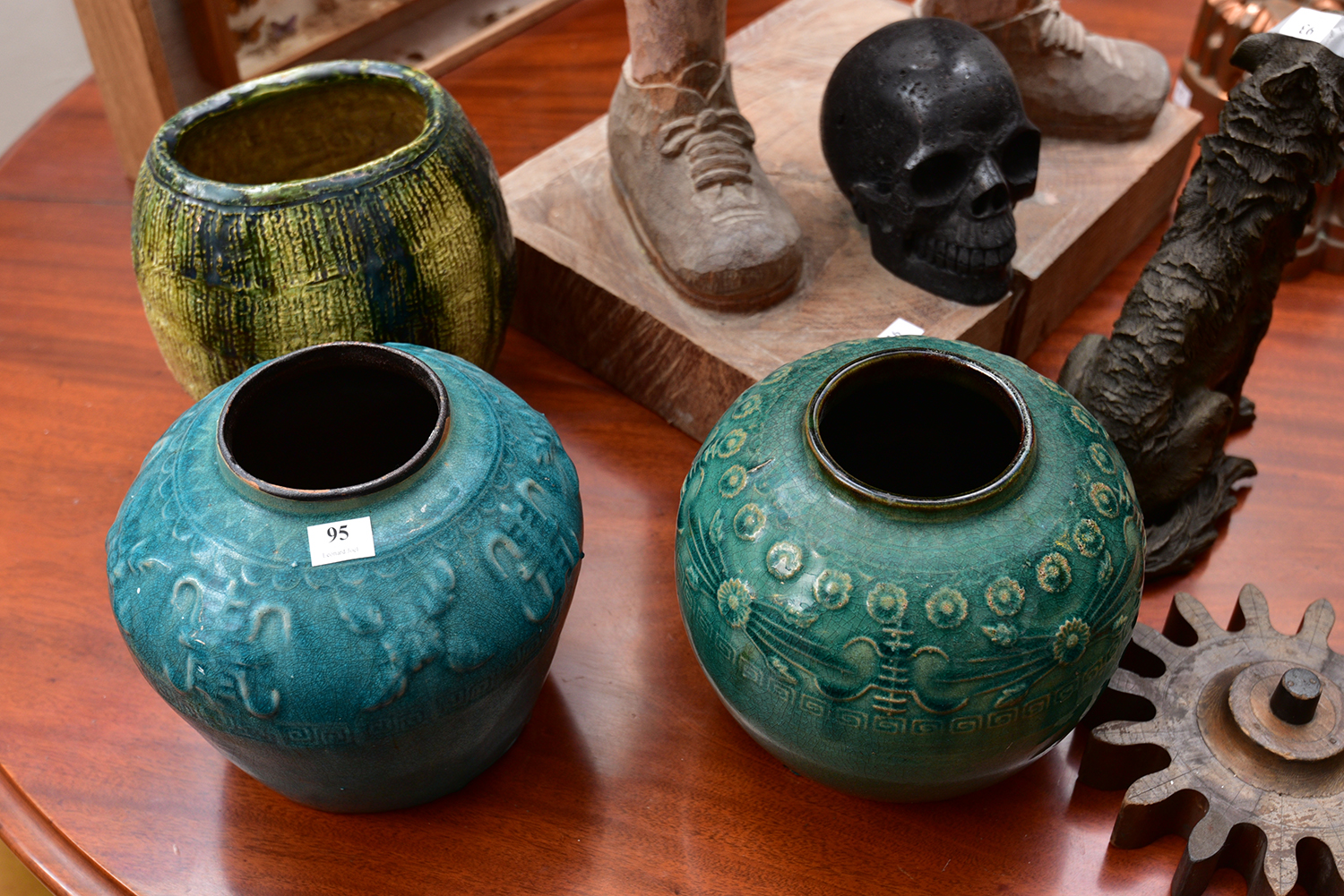 Appraisal: TWO GREEN GLAZED TERRACOTTA VASES AND A GLAZED EARTHENWARE VASE