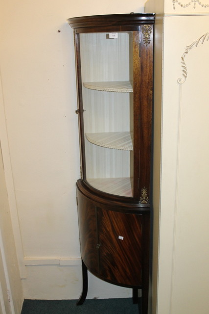 Appraisal: A REPRODUCTION FRENCH STYLE GLAZED CORNER CUPBOARD