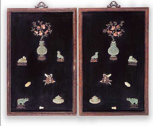 Appraisal: A pair of lacquered wood wall panels with colored stone