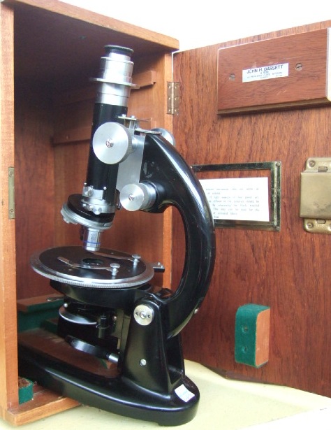 Appraisal: An ebonised brass and chromed petrological microscope circa by J