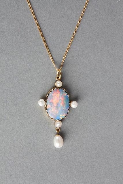 Appraisal: AN OPAL DOUBLET AND PEARL PENDANT AND CHAIN claw set