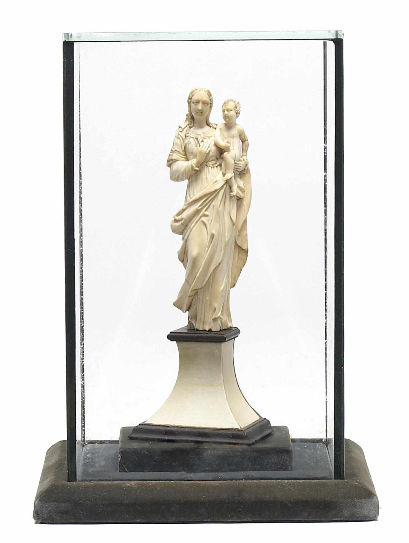 Appraisal: An Italian Baroque carved ivory figure of the Virgin and