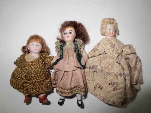 Appraisal: Three small bisque dolls one with moulded hair all with