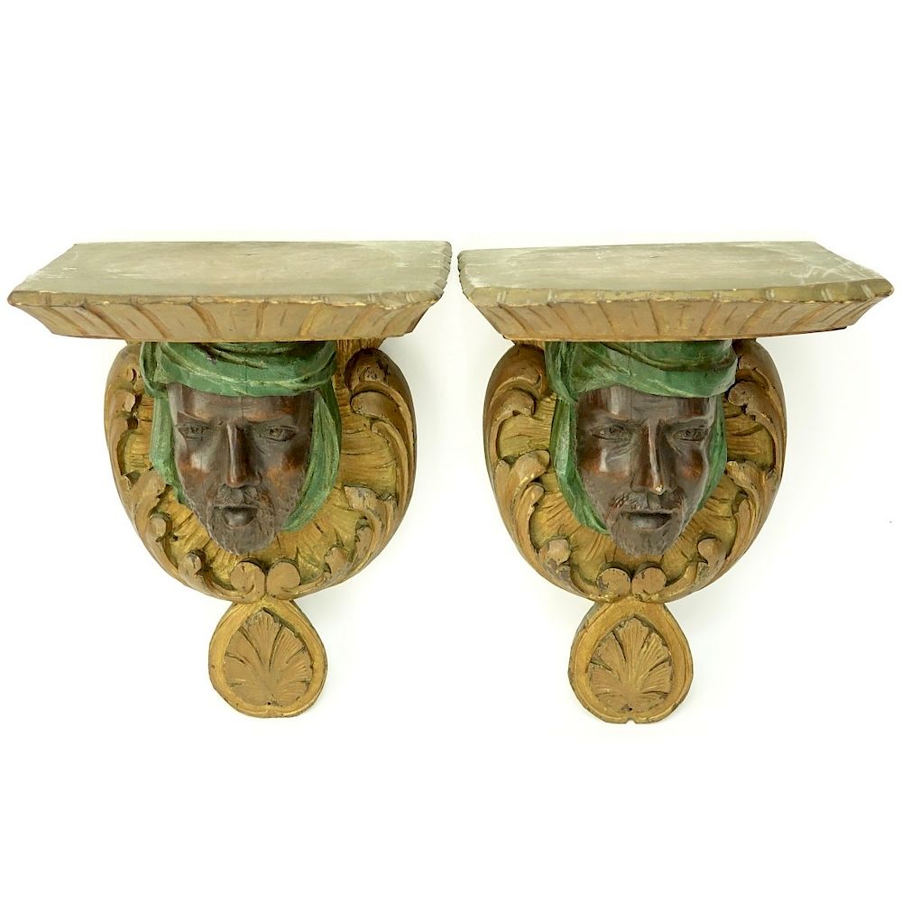 Appraisal: Pair of Carved Wood Arab Figural Wall Brackets Pair of