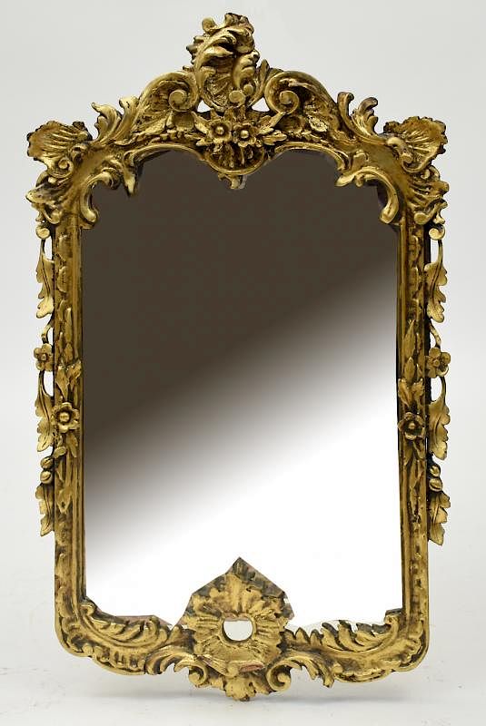 Appraisal: Ornate Carved and Gilt Wall Mirror Ornate Continental carved and