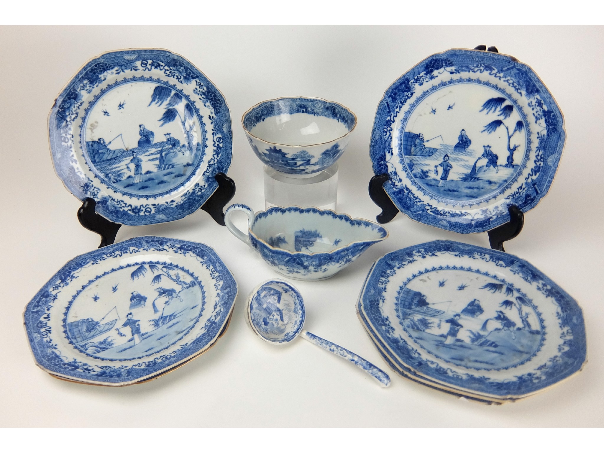 Appraisal: Seven Chinese export blue and white octagonal platespainted with figures