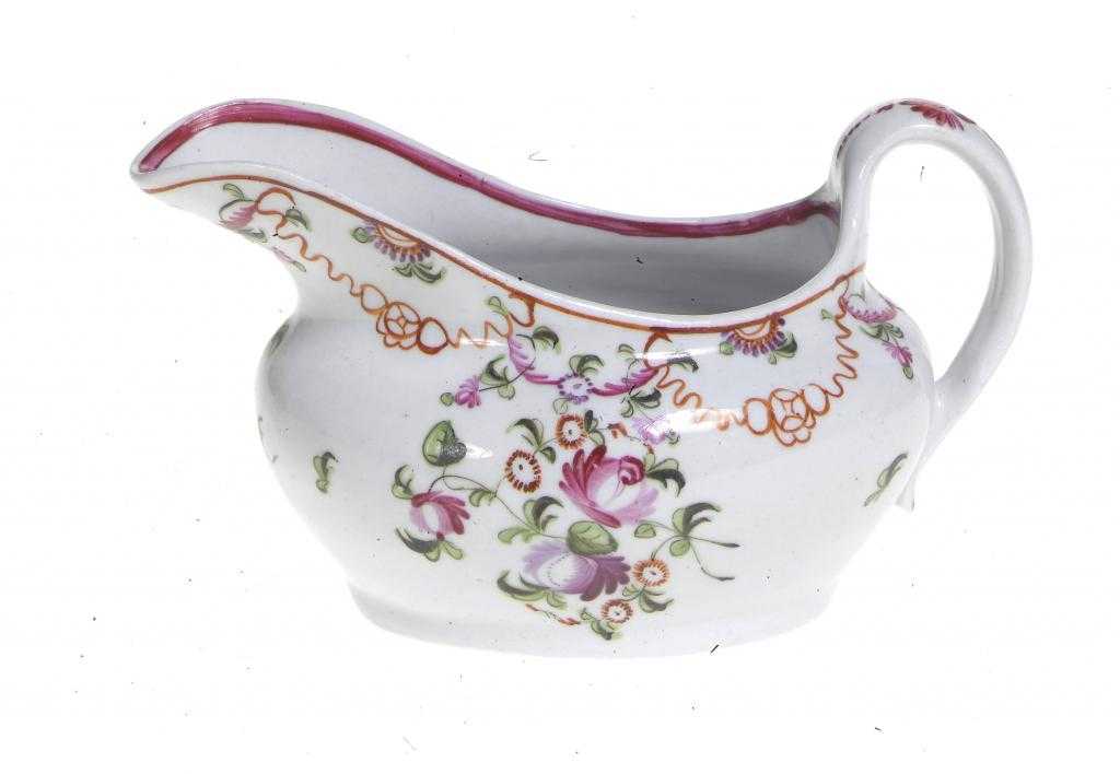 Appraisal: A NEW HALL CREAM JUG enamelled with Knitting pattern of