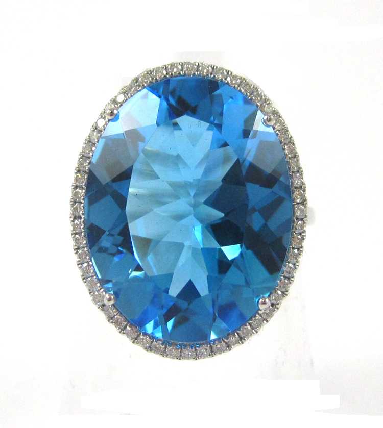 Appraisal: BLUE TOPAZ DIAMOND AND WHITE GOLD RING The k white