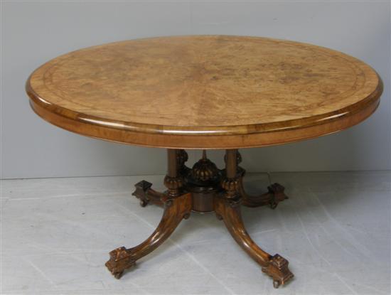 Appraisal: Victorian walnut and marquetry inlaid loo table on quadruple column