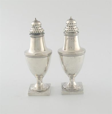 Appraisal: A pair of George III vase shaped pepperettes of vase