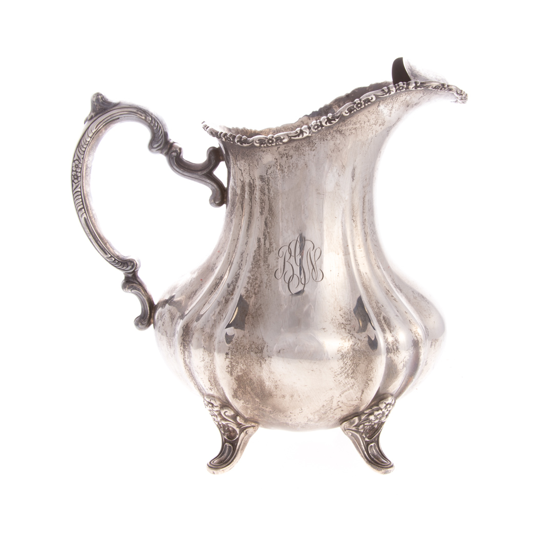 Appraisal: Sterling silver water pitcher with ice lip in the Lancaster