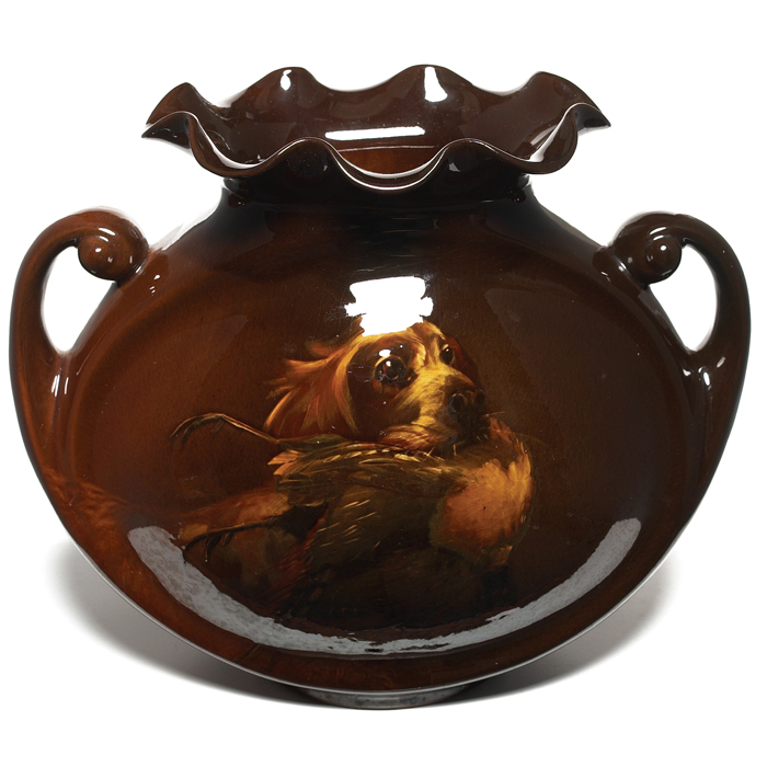 Appraisal: Rozane pillow vase brown glaze with a well painted portrait