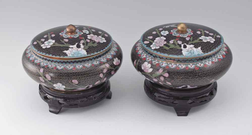 Appraisal: PAIR CHINESE CLOISONNE COVERED JARS Bird and flower design on