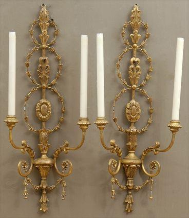 Appraisal: PAIR OF GEORGE III-STYLE CARVED GILTWOOD TWO-LIGHT WALL APPLIQUES Each