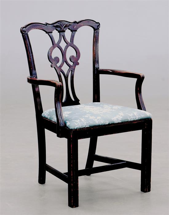 Appraisal: Georgian style carved mahogany armchair circa yoke crest over latticework