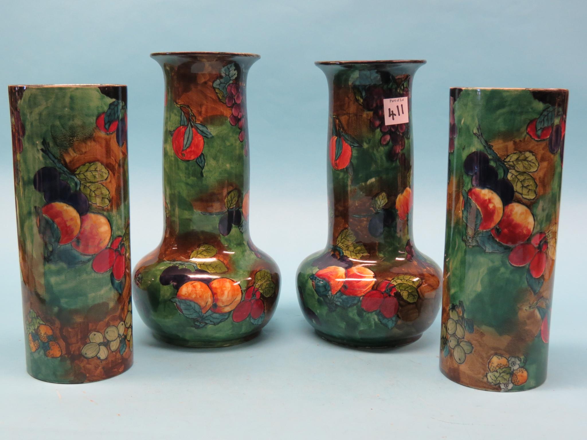 Appraisal: A pair of Hancocks Titian Ware vases with cylindrical necks