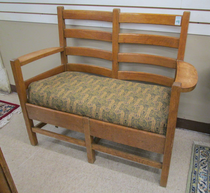 Appraisal: AN OAK DOUBLE CHAIR-BACK SETTEE American Craftsman influence c each