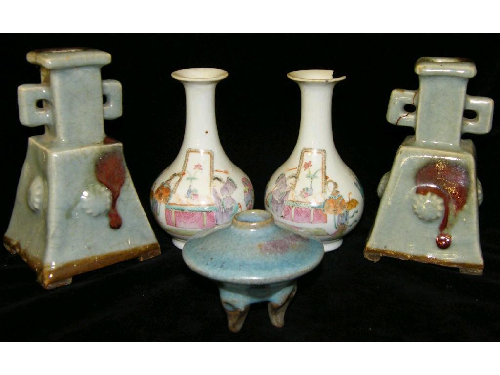 Appraisal: Pair of Chinese pale celadon and splashed red glaze candlesticks