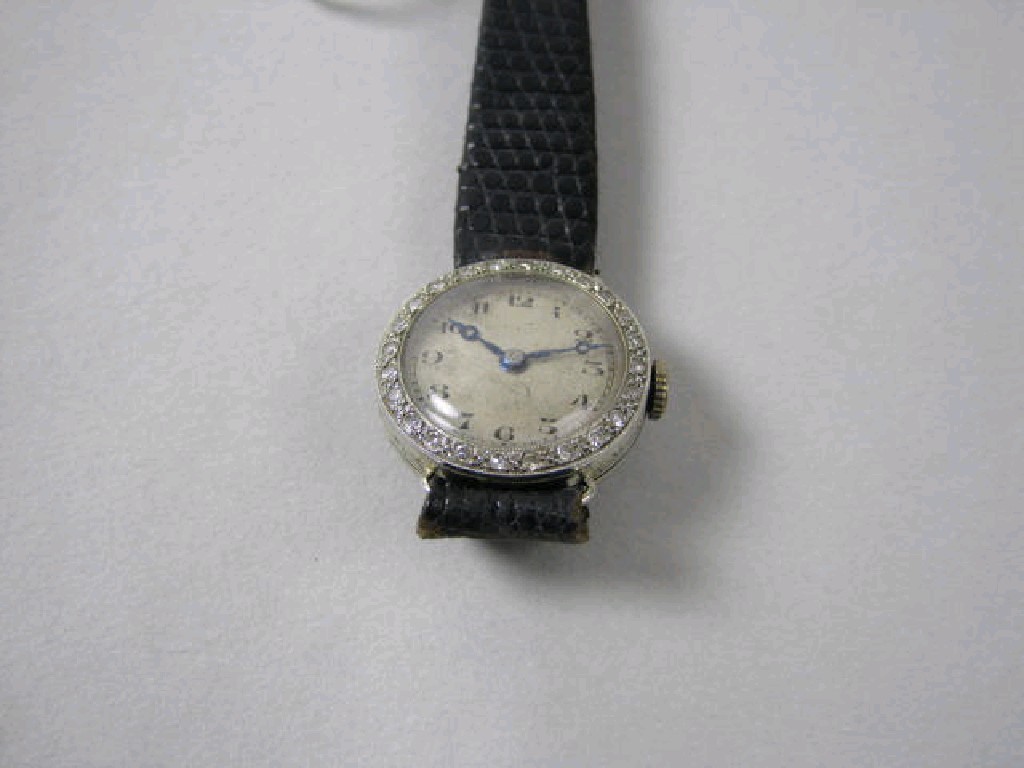 Appraisal: A Lady's Cocktail Watch the circular dial with arabic numerals