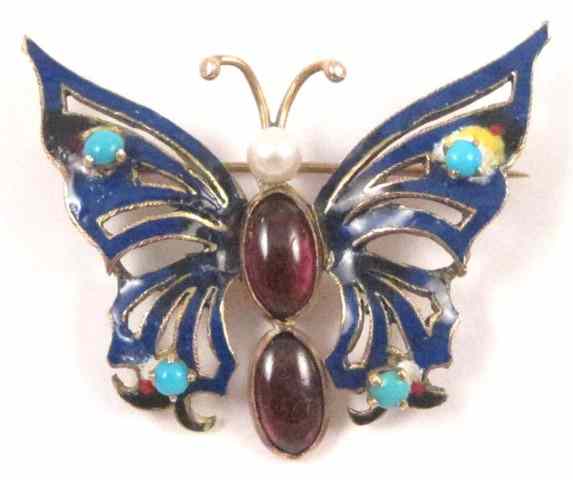 Appraisal: COLOR ENAMEL AND GOLD BUTTERFLY BROOCH k yellow gold covered