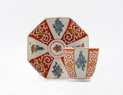 Appraisal: A Chelsea octagonal beaker and saucer painted in the Kakiemon