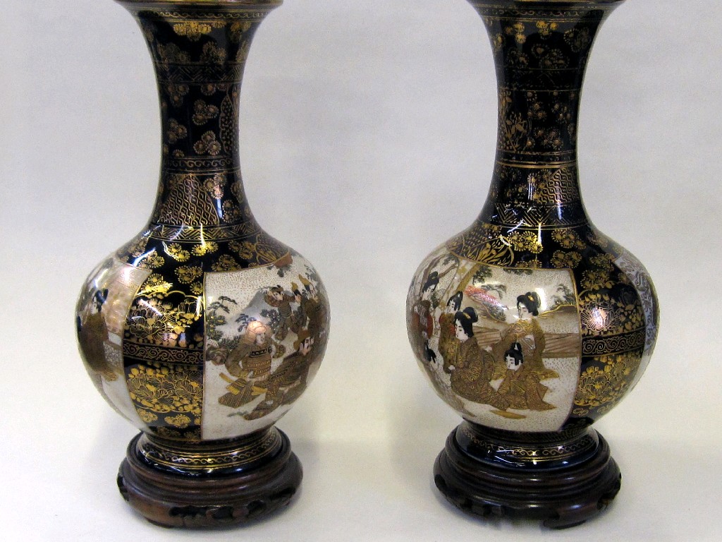 Appraisal: Pair of Satsuma vases each decorated to one side with