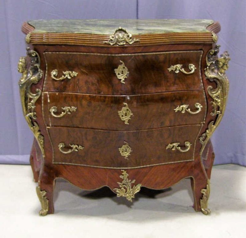 Appraisal: French Style Bombe Chest French style ormolu mounted bombe chest