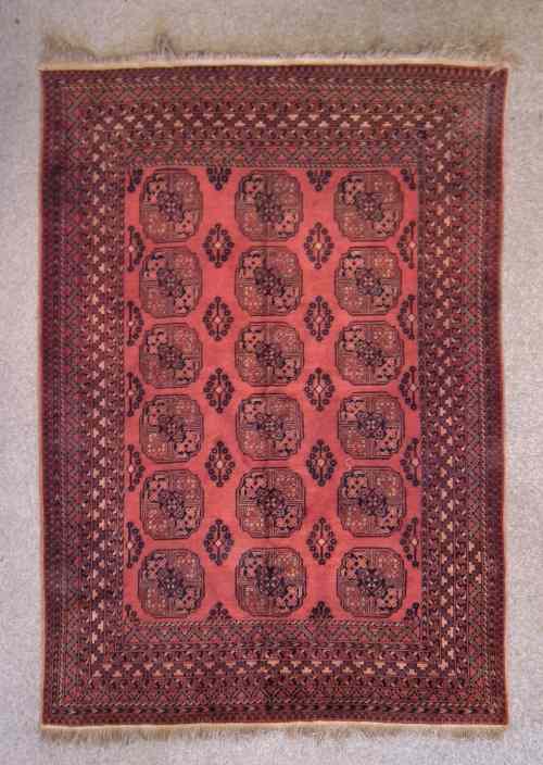 Appraisal: A th Century Afghan Bokhara carpet woven in muted colours