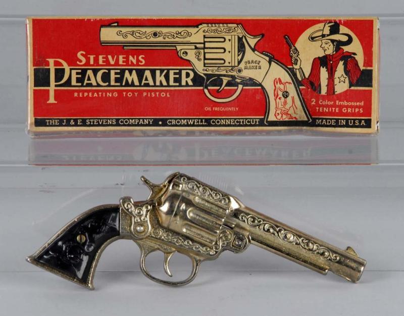 Appraisal: Stevens Peacemaker Cap Gun Description Includes box Toy Near Mint