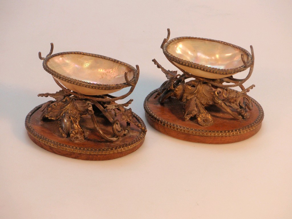 Appraisal: A pair of Palais Royale gilt metal mother-of-pearl shell salts