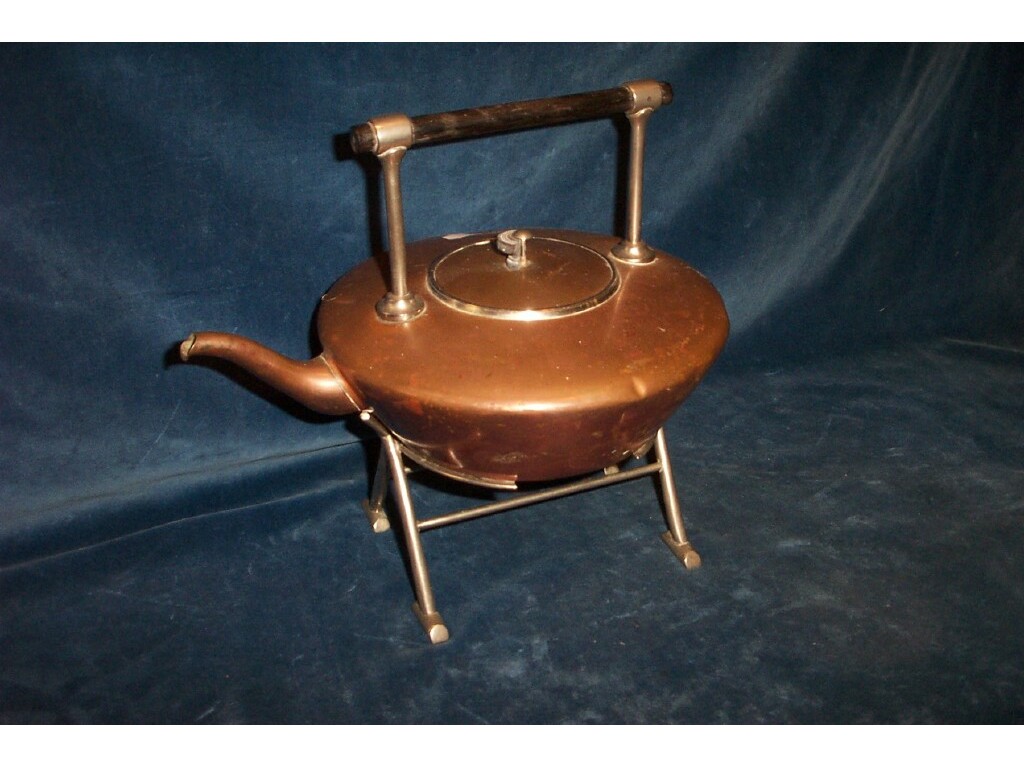 Appraisal: A copper and silver plated spirit kettle and stand with