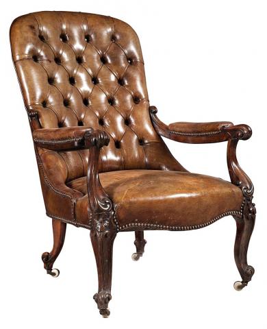 Appraisal: Victorian Leather Upholstered Rosewood Armchair The tufted back above a