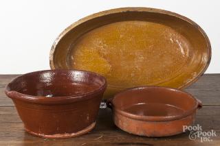 Appraisal: Three redware baking dishes largest - '' h '' w